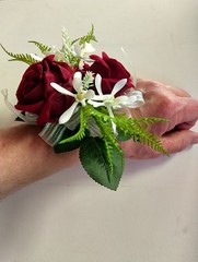 Cute little rose and orchid wrist corsage
