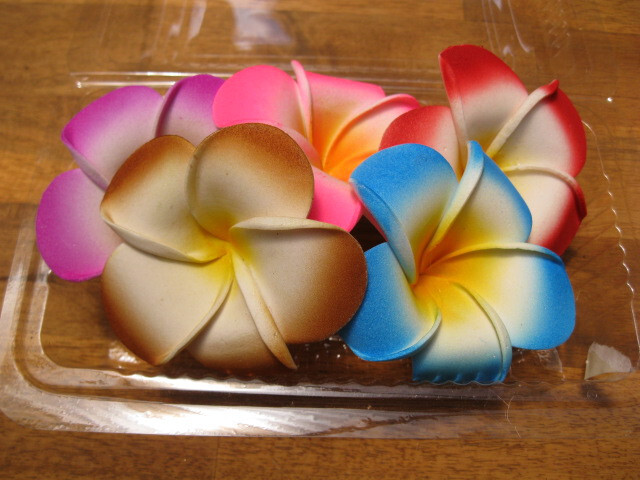 Frangipani Hairclips 7cm flower with matching color clips.