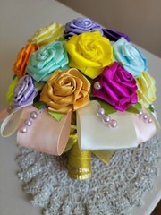 Handmade bouquet of artificial ribbon roses. Each flower is handmade.