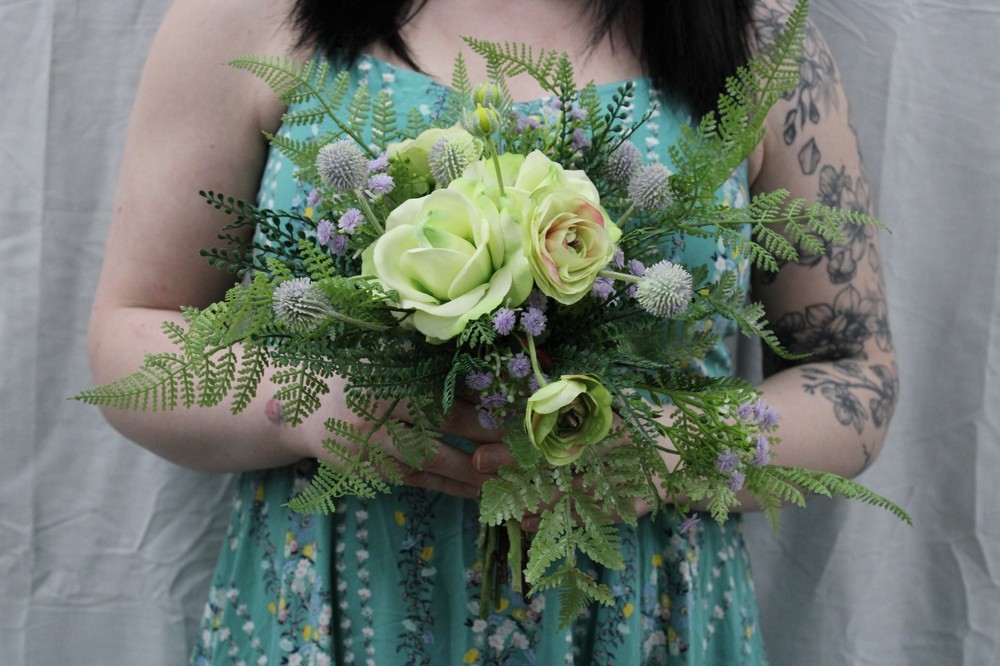 Light green rose & ranunculus w/ lavendar hints w/ matching boutonniere