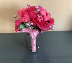Pink roses, rosebuds and silver berries bridal bouquet