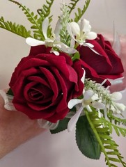Cute little rose and orchid wrist corsage