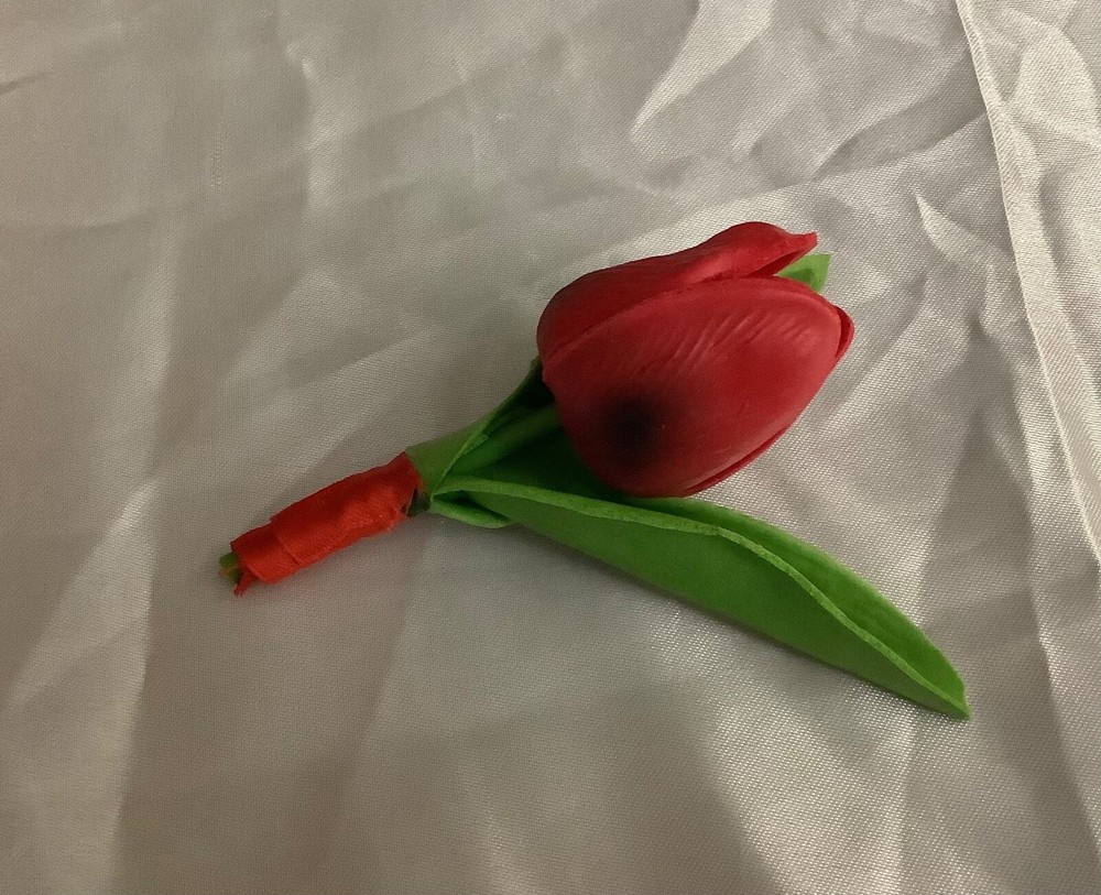 real touch tulip boutonniere…..you choose color