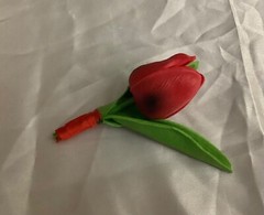 real touch tulip boutonniere…..you choose color