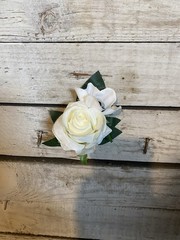 White Roses with Black center Anemone with Matching boutonnière ( magnet)