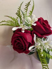 Cute little rose and orchid wrist corsage