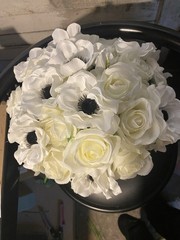 White Roses with Black center Anemone with Matching boutonnière ( magnet)